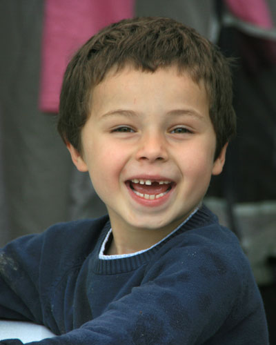 Paul Barnard as a smiling 5 year old boy with missing front tooth